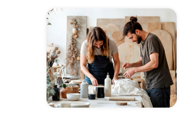 A man and women creating pottery